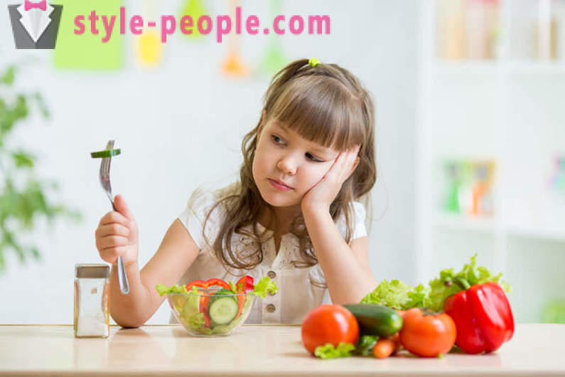 Hoe maak je een kind om groenten te eten te leren