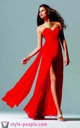 Modieuze rode jurk de vloer